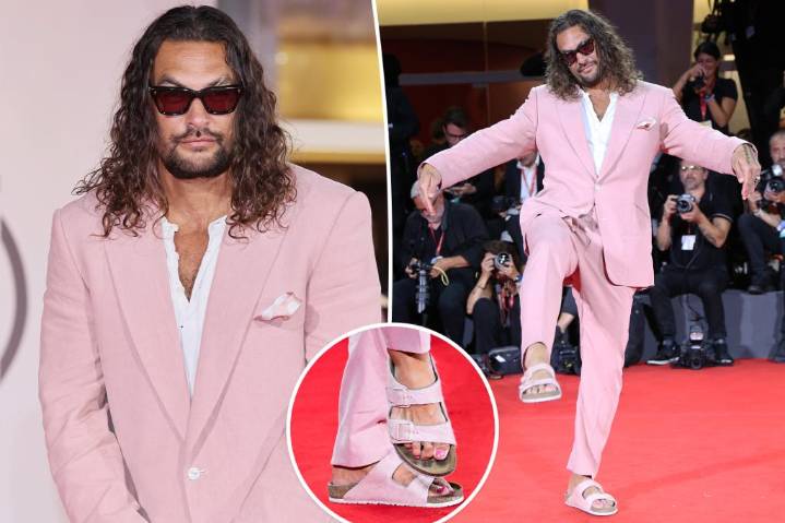 Jason Momoa paints his toenails pink to match his pink suit at 'In the Hand of Dante' premiere