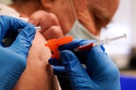 Mass. says everyone should get COVID vaccine, despite federal guidance