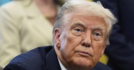 Trump blames Minnesota governor for raised flags