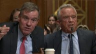 Virginia Sen. Warner challenges Kennedy over COVID
