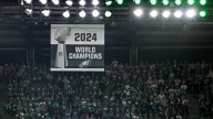 Eagles unveil Super Bowl championship banner, but team stays in locker room