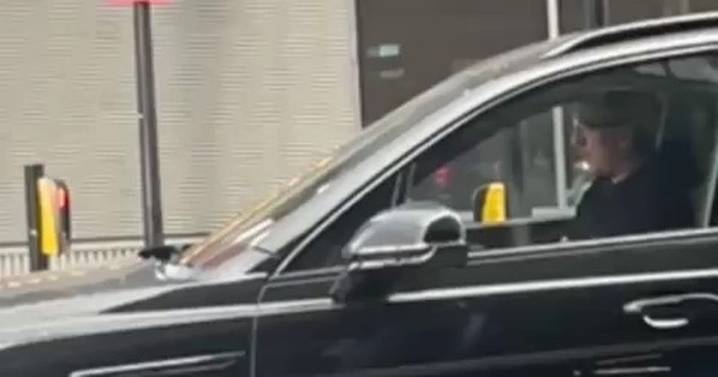 Ex-Manchester United star Gary Neville spotted using phone while driving £170,000 Bentley Bentayga
