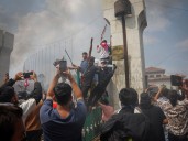 Nepali PM forced to step down, parliament torched amid deadly protests