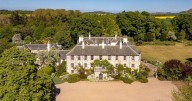 Historic East Lothian mansion with library and private river joins the market
