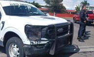 Detienen a presunto escolta tras agredir a motociclista; portaba 2 armas
