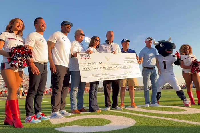 Texans’  Cal McNair, Hannah McNair, Andre Johnson, Mike Tomon visit Kerrville, give donations after flooding tragedy