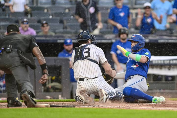 Jays trail behind Yankees as game enters rain delay