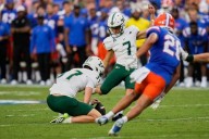 Gramatica's kick lifts South Florida to an 18-16 upset at No. 13 Florida and heats Napier's seat