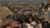 Israel says it will reopen a route for 48 hours for Palestinians to leave Gaza City as it escalates offensive