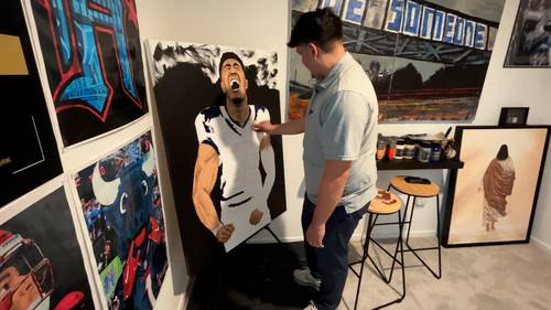 Artist trades his paintbrush for a football