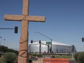 Armed man arrested at site of planned Kirk memorial service