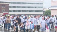 Annual Labor Day parade draws hundreds despite rain
