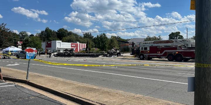 Police: Tractor-trailer driver ran red light before deadly crash