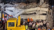 Dozens feared trapped after school building collapses in Indonesia