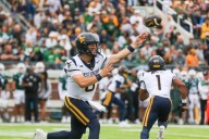 Evaluation of quarterbacks continues for Rodriguez, who vows to ‘give everybody opportunities’