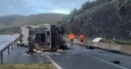 Lorry overturns and bursts into flames on busy motorway sparking rush hour delays