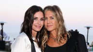 Jennifer Aniston Gives Courteney Cox a Frizz