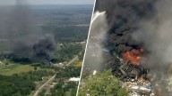 Tires at Pa. junkyard catch fire, sending black smoke into air