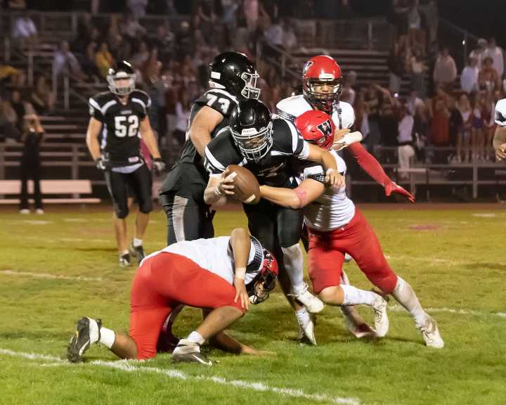 Longmeadow football falls to Woburn on the road