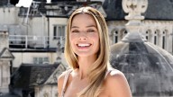 Margot Robbie steals the show in daring thigh split gown
