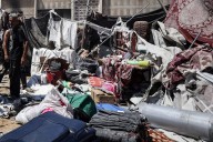 Israeli bombardment pushes more Palestinians out of Gaza City homes