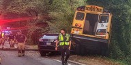 Road reopens after crash between car, bus tears down power poles in Roswell