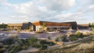 Evans breaks ground on new police station