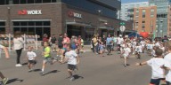 Thousands of kids run through the Haymarket for The Pumpkin Run
