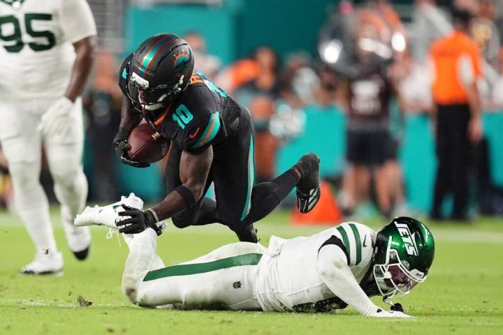 Dolphins’ Tyreek Hill carted off field and taken to hospital with serious left leg injury