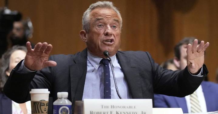 Kennedy tries to defend COVID-19 vaccine stance in raucous Senate hearing