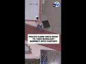 Police climb onto roof to take burglary suspect into custody