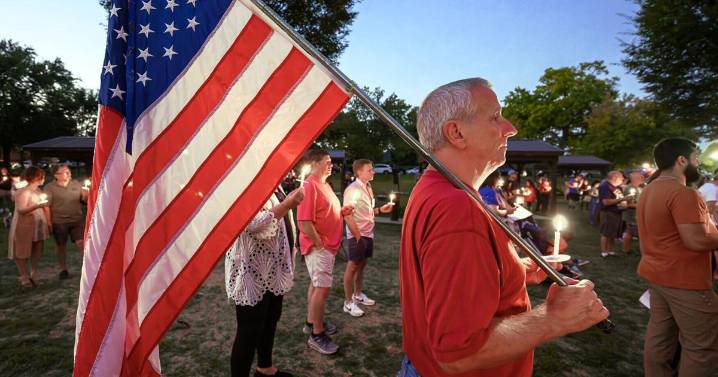 Hundreds gather in Baker Park to mourn Charlie Kirk