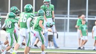 Yorktown football breaks in new field with big victory over New Castle