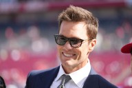 Tom Brady in Raiders coach’s booth sparks questions about conflict of interest with FOX