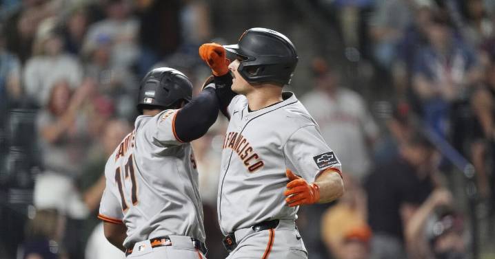 Chapman homers twice after appealing suspension to help the Giants beat the Rockies