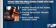 Woman threatens middle school student with taser