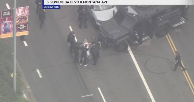 SWAT, LAPD involved in hours long standoff with apparently nude woman in West Los Angeles