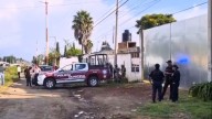 Abandonan Cuerpos Sin Vida con Impactos de Bala en un Coche y una Vivienda en Puebla