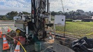 Contractor drilling test bores for train tunnels under Del Mar