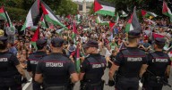 Authorities say over 100,000 at pro-Palestinian protests which forced early end to Spanish Vuelta