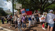 Thousands rally in Austin, Texas to protest Trump and Abbott's redistricting in the state