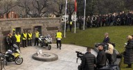 Police honour slain officers as manhunt continues
