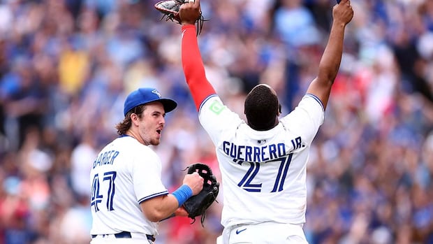 Blue Jays secure playoffs spot with 8-5 win against Royals