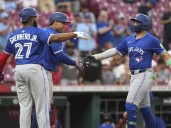 Springer goes deep twice as Blue Jays hold off Reds, 12