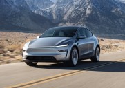 Tesla asks EPA not to roll back emissions rules as Trump calls climate change a 'con job'