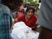 Photos: Crowd crush at political rally in southern India kills 39 people