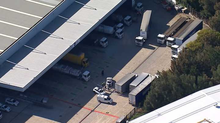 Truck driver killed after being struck by forklift while working at Menzies Aviation warehouse in Matraville, Sydney
