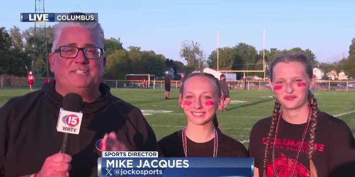 Jocko speaks with the managers of the Columbus High School football team