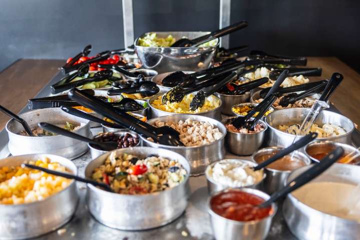 Freshly stocked salad bar and hot bar in Essexville will satisfy lunch time cravings