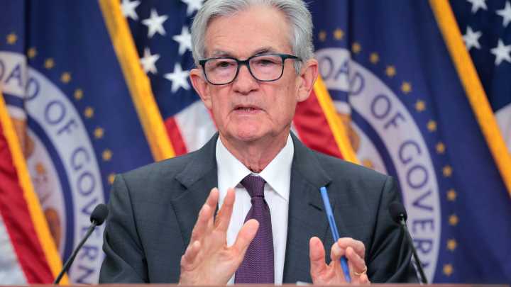 Federal Reserve cuts key rate by a quarter-point and signals two more cuts by year end